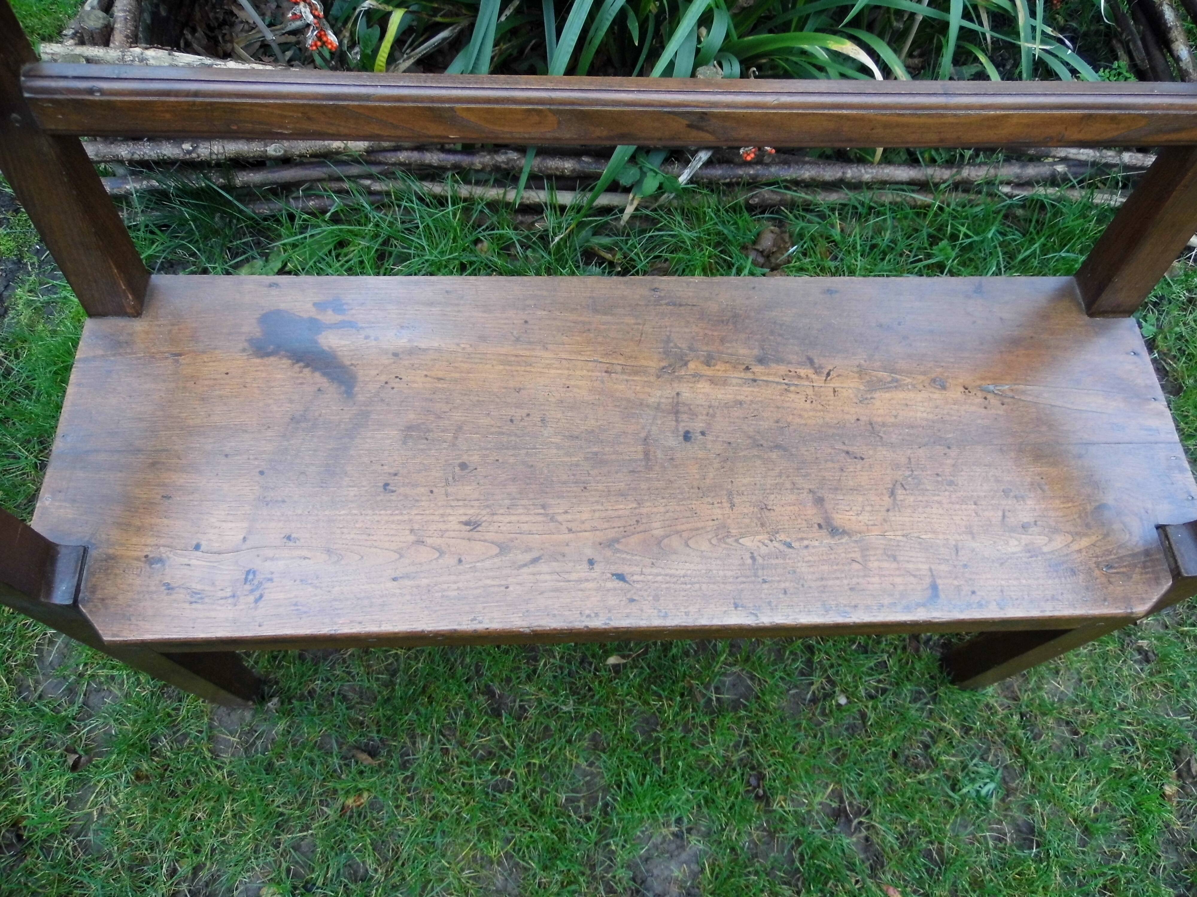 Ancient chestnut bench with armrests, late 19th century