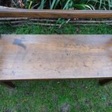 Ancient chestnut bench with armrests, late 19th century