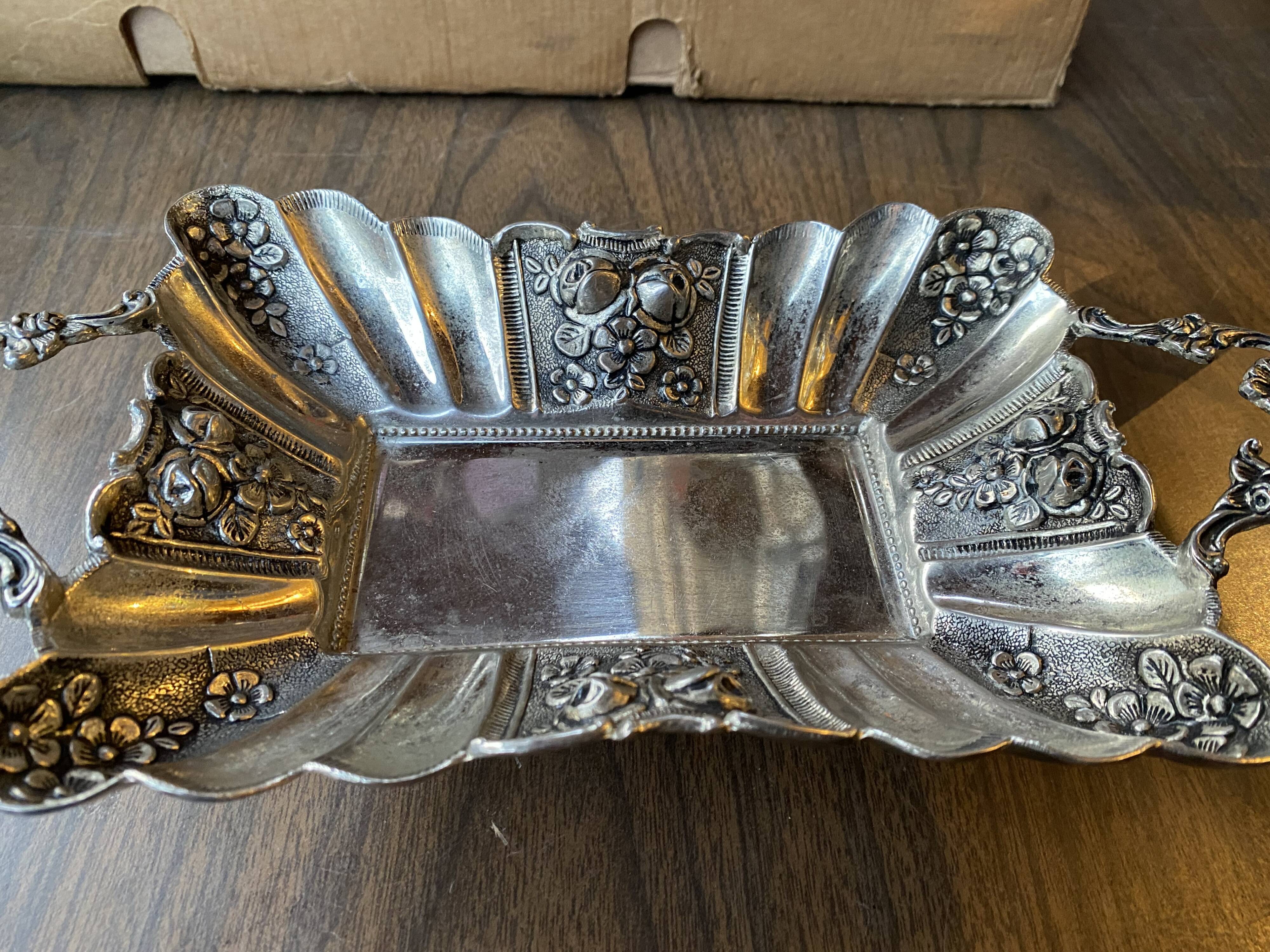 Empty pocket in silver metal