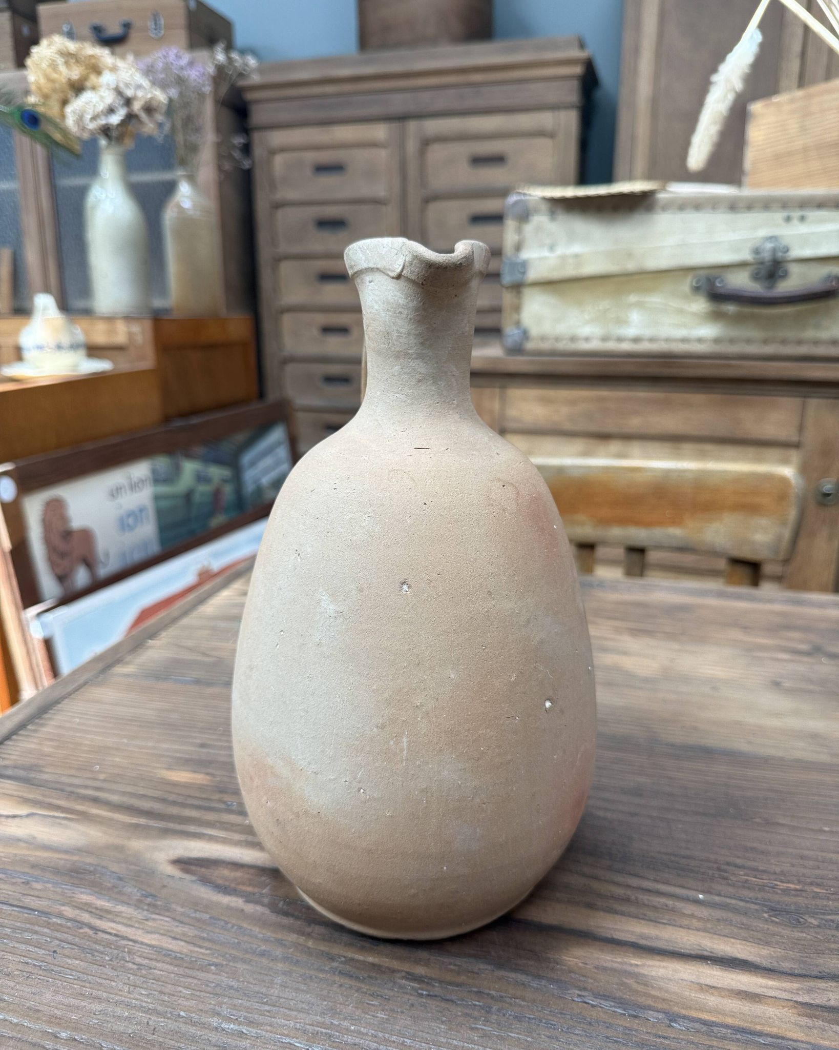 Unfired clay pitcher