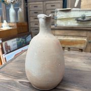 Unfired clay pitcher