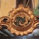 Miroir de style Louis XV en bois doré XXème