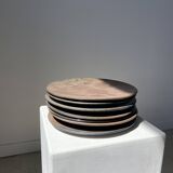 Series of 7 brown ceramic plates