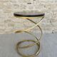 Spring-shaped end table in gold metal