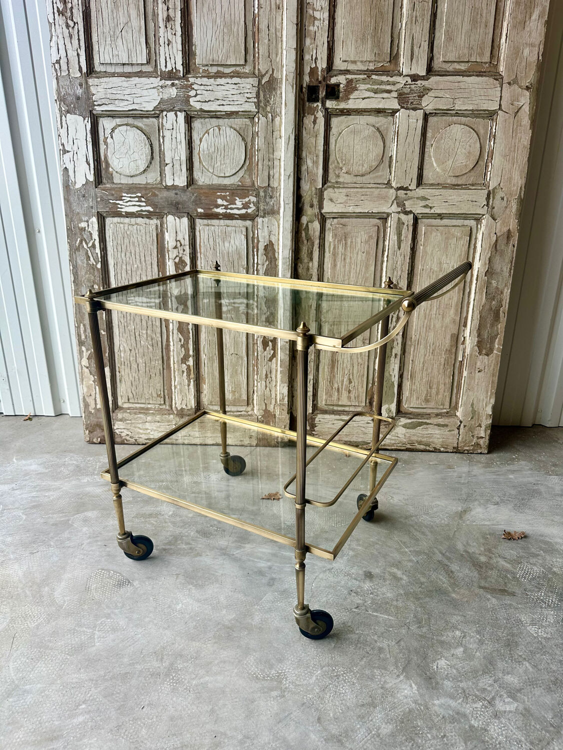 Vintage brass rolling bar cart