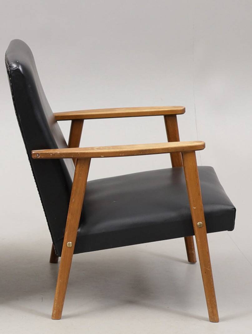 Vintage imitation leather armchair made in Germany