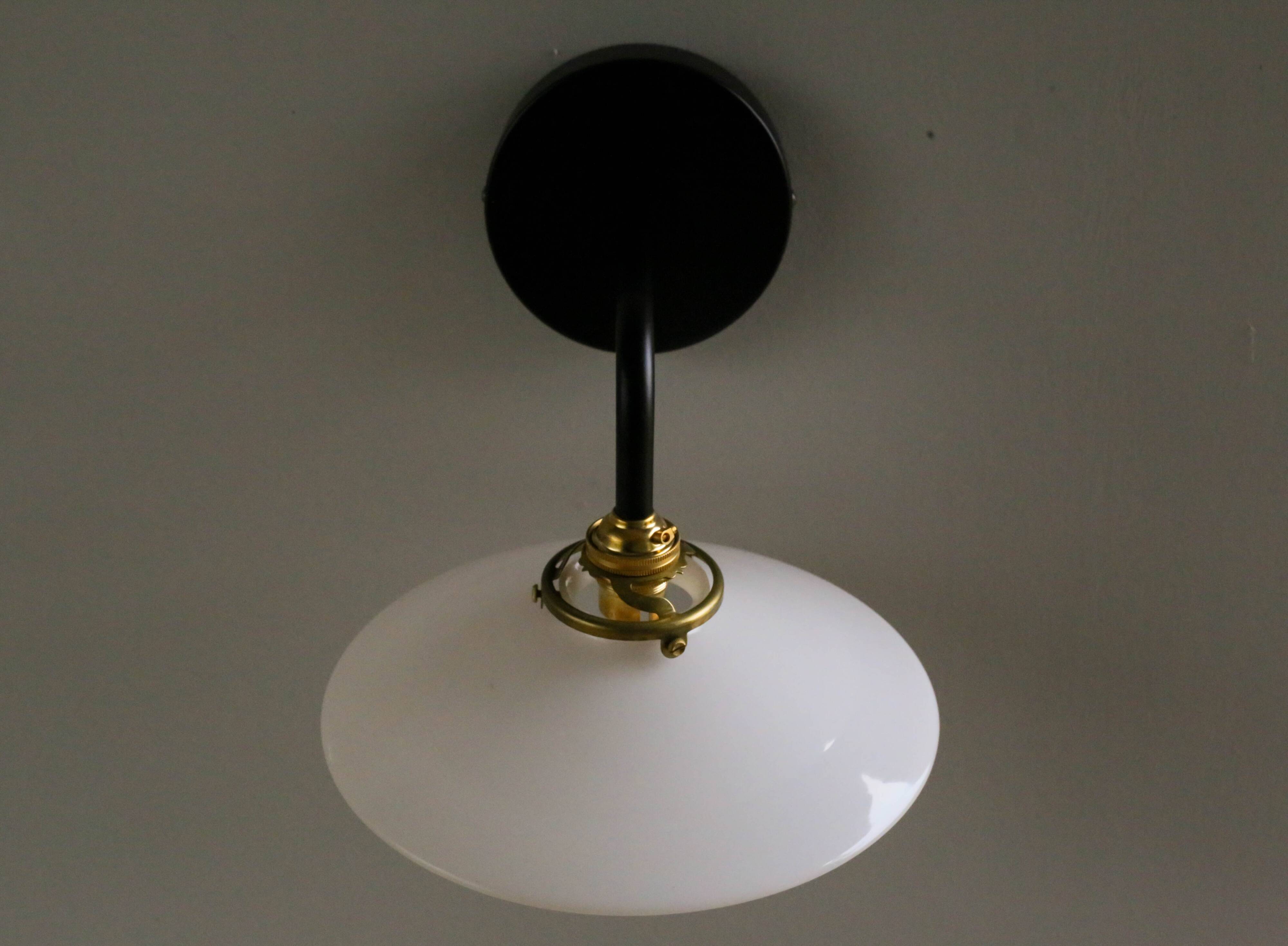 White opaline wall light - brass socket and arm, metal support