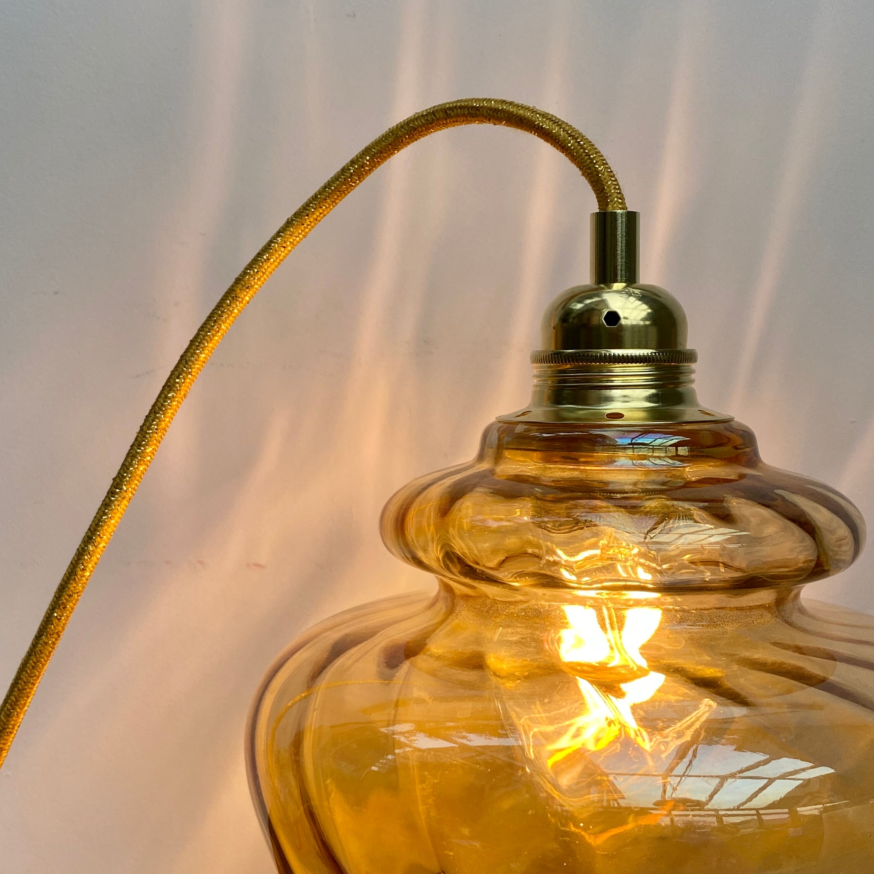 Vintage tulip walker in amber glass