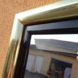 Brass and plexiglass mirror, 80s design