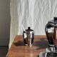 Tea set including teapot, milk jug, sugar bowl and butter dish