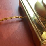 Lamp base in gilded brass, oval silk lampshade with a checkered pattern in burgundy.