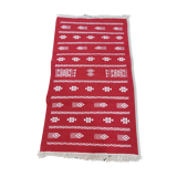 Handmade red and white carpet