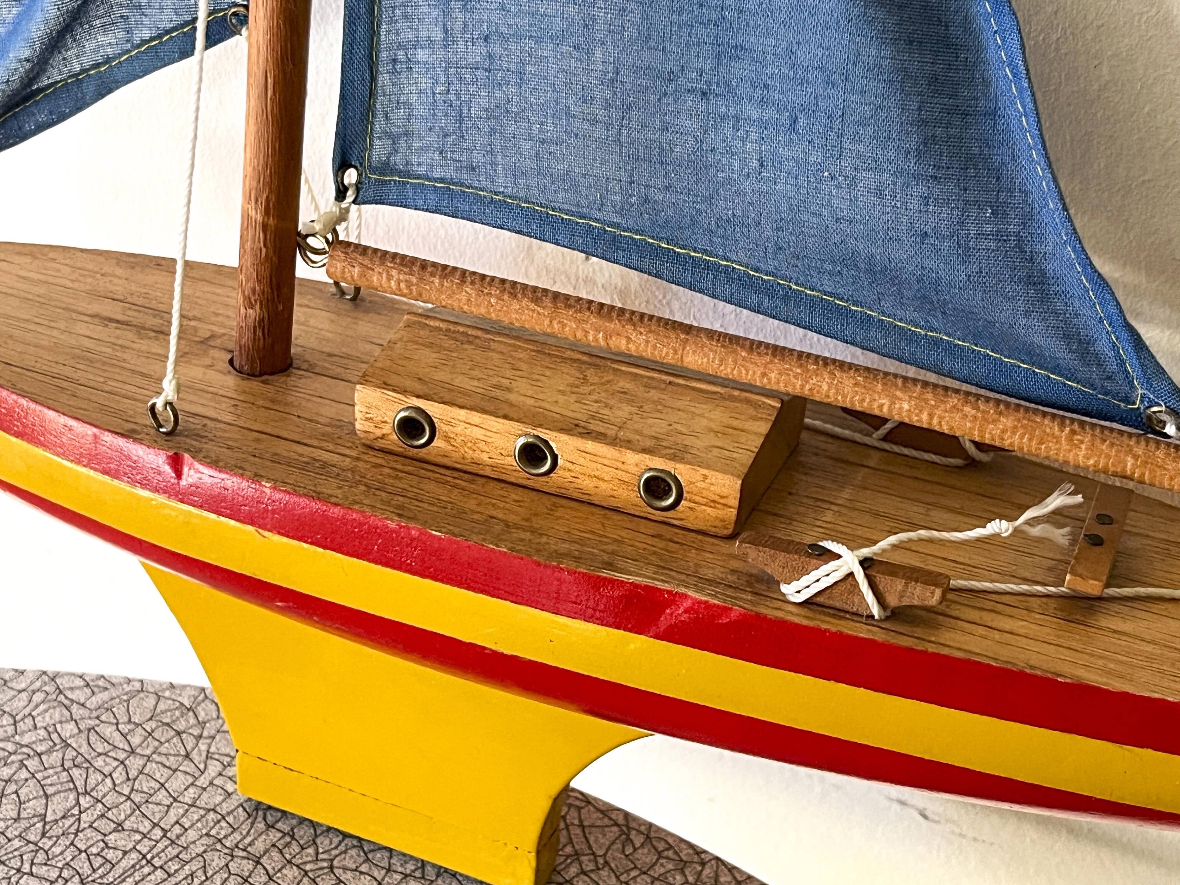 Wooden sailboat, cotton sails, vintage toy