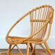 Children's shell armchair in rattan 1960s