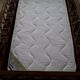 Vintage wooden baby cot from the 1960s.