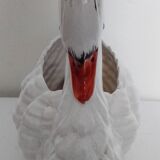 ceramic pot cover in the shape of a swan