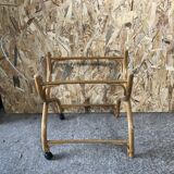 Old woven wicker baby cradle