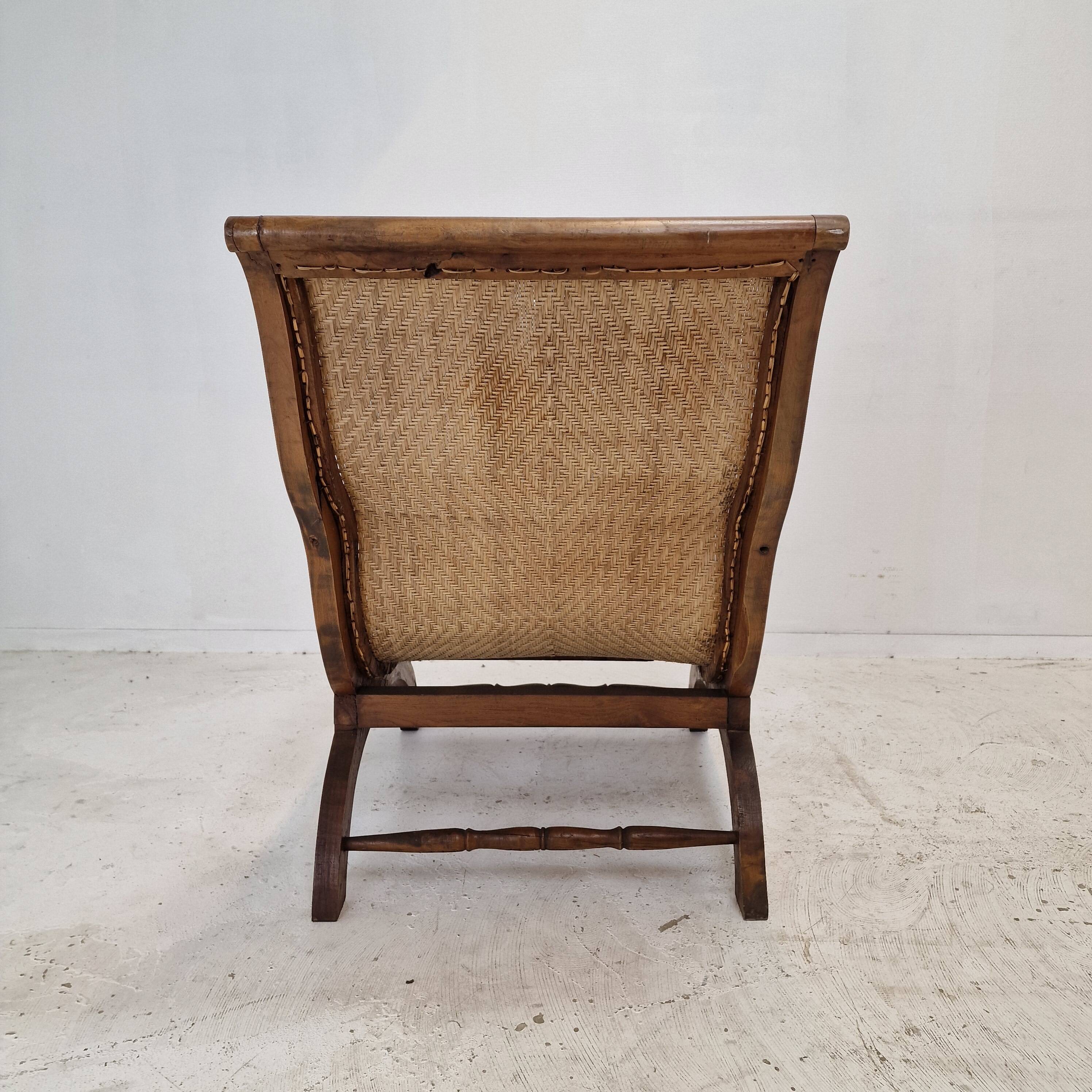Colonial Style Carved Caned Plantation Chair