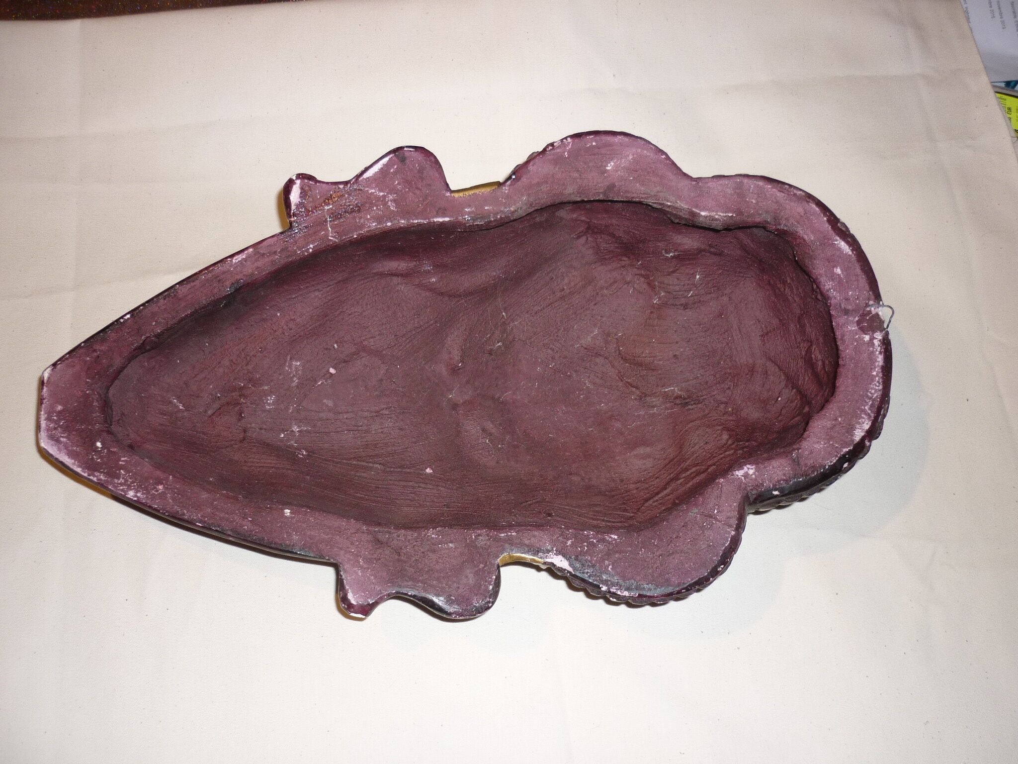 African mask in earth