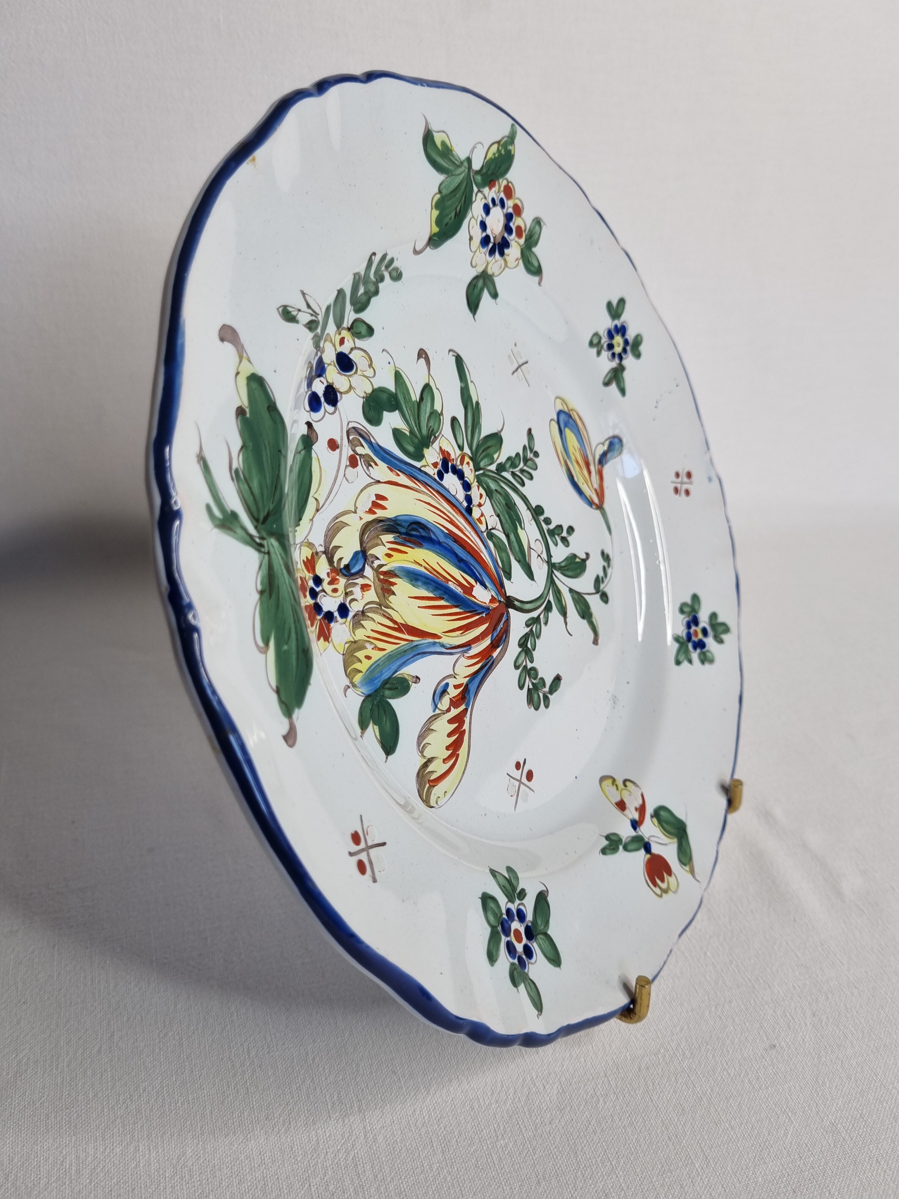 Ancient plate in earthenware of Moustiers 18th, 19th