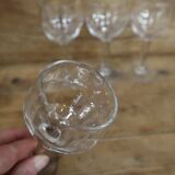 4 old aperitif glasses with transparent stem and faceted relief from the 50s and 60s