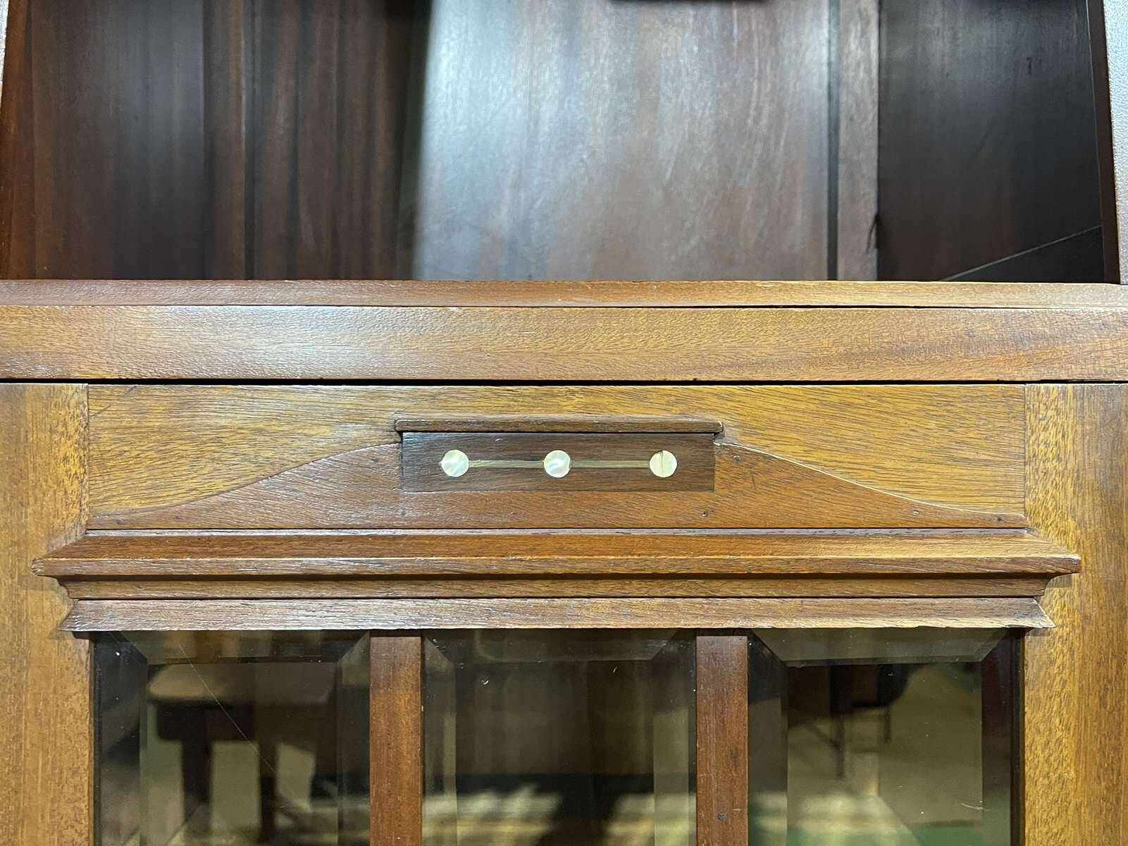Art Nouveau mahogany buffet with clock in the style of G. Serrurier Bovy.