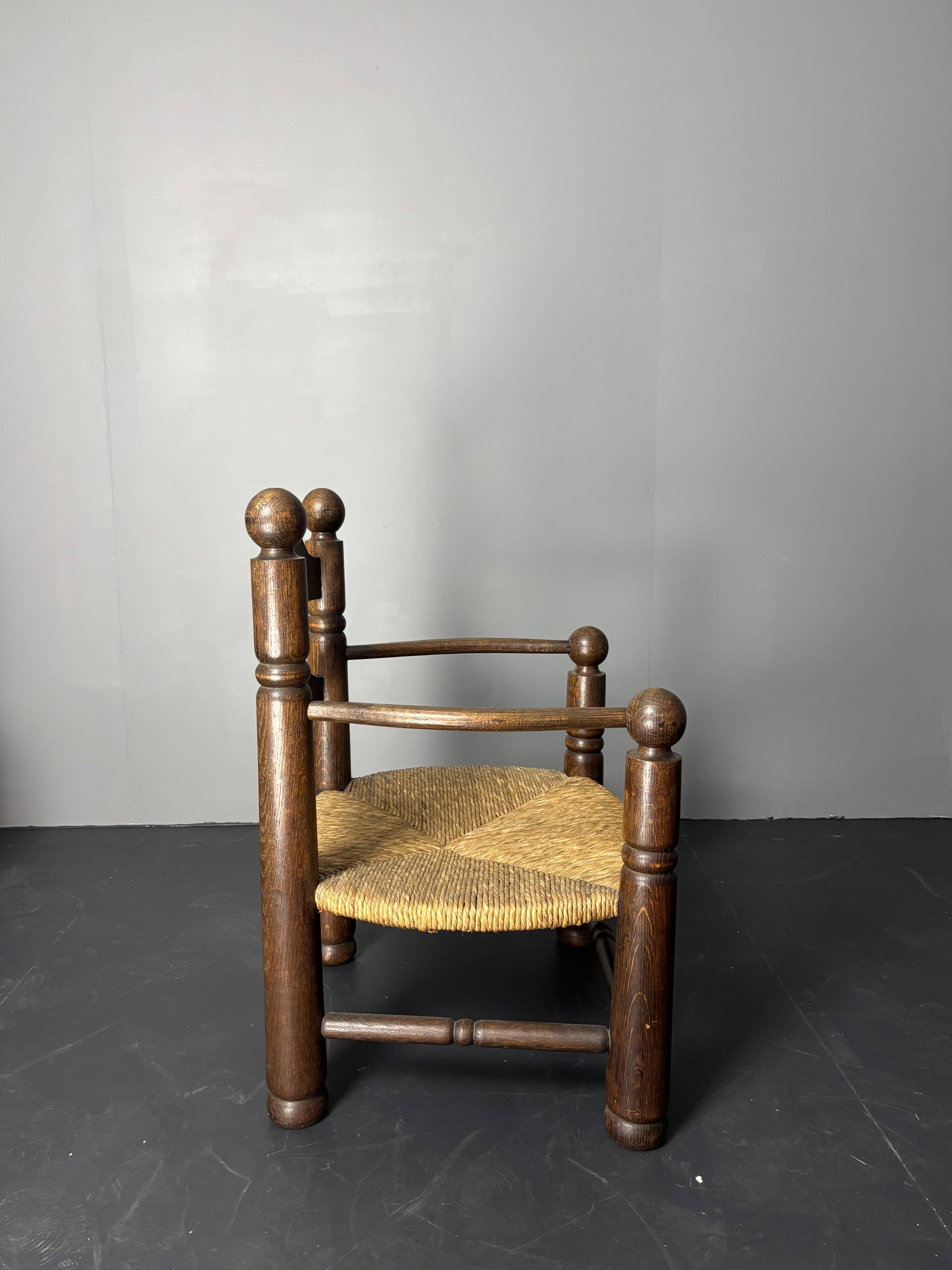 Brutalist French low rush oak side armchair by Charles Dudouyt ca 1940s