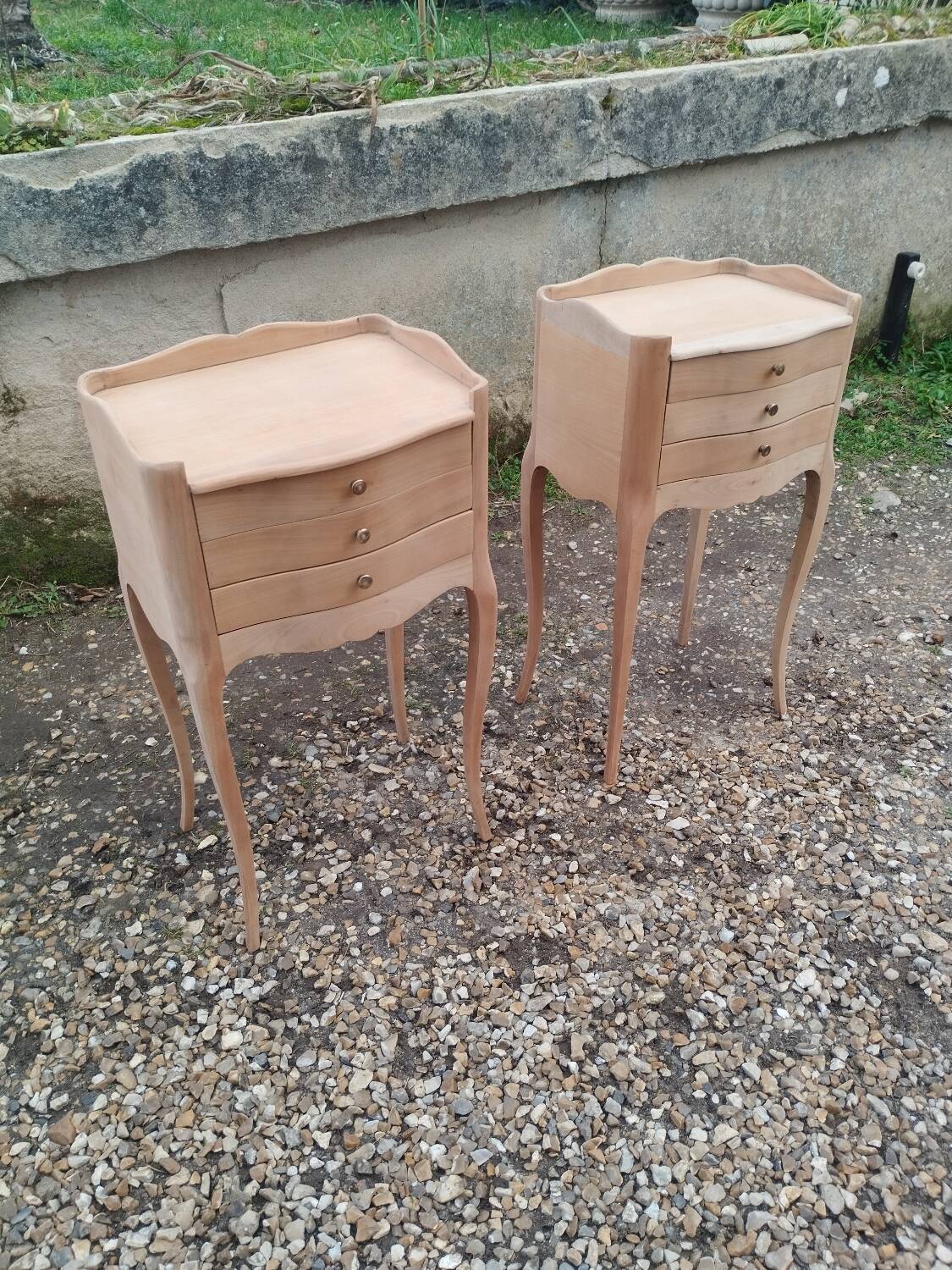 Pair of antique wooden bedside tables in Louis XV style.