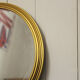 Miroir vintage rond  bordure acier doré