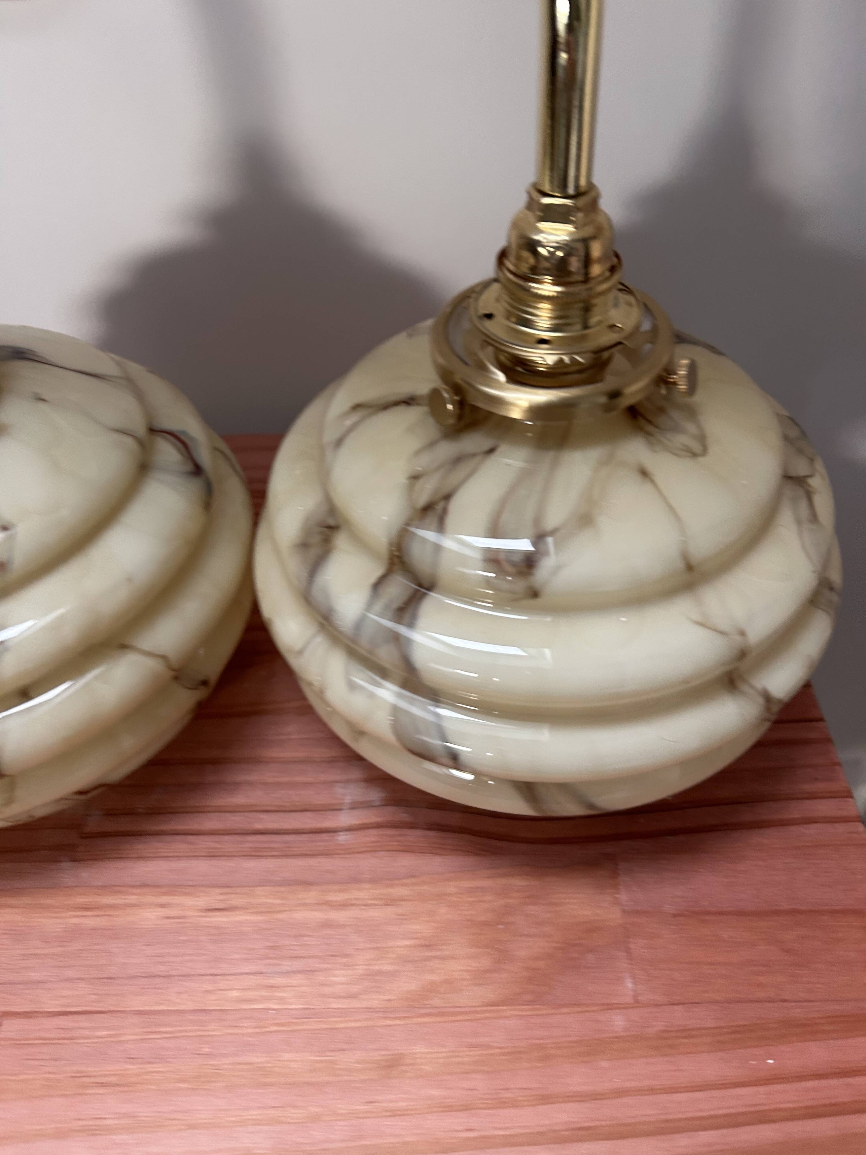 Pair of vintage marbled opaline globe wall lights