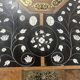 Blackened wood display table with marquetry top, Spain, 19th century.