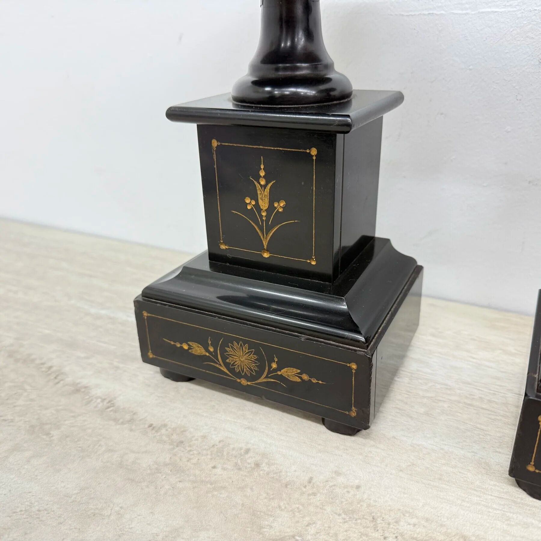 Antique French black marble cassoulets gilt decor pedestals neoclassical pair, 1900s
