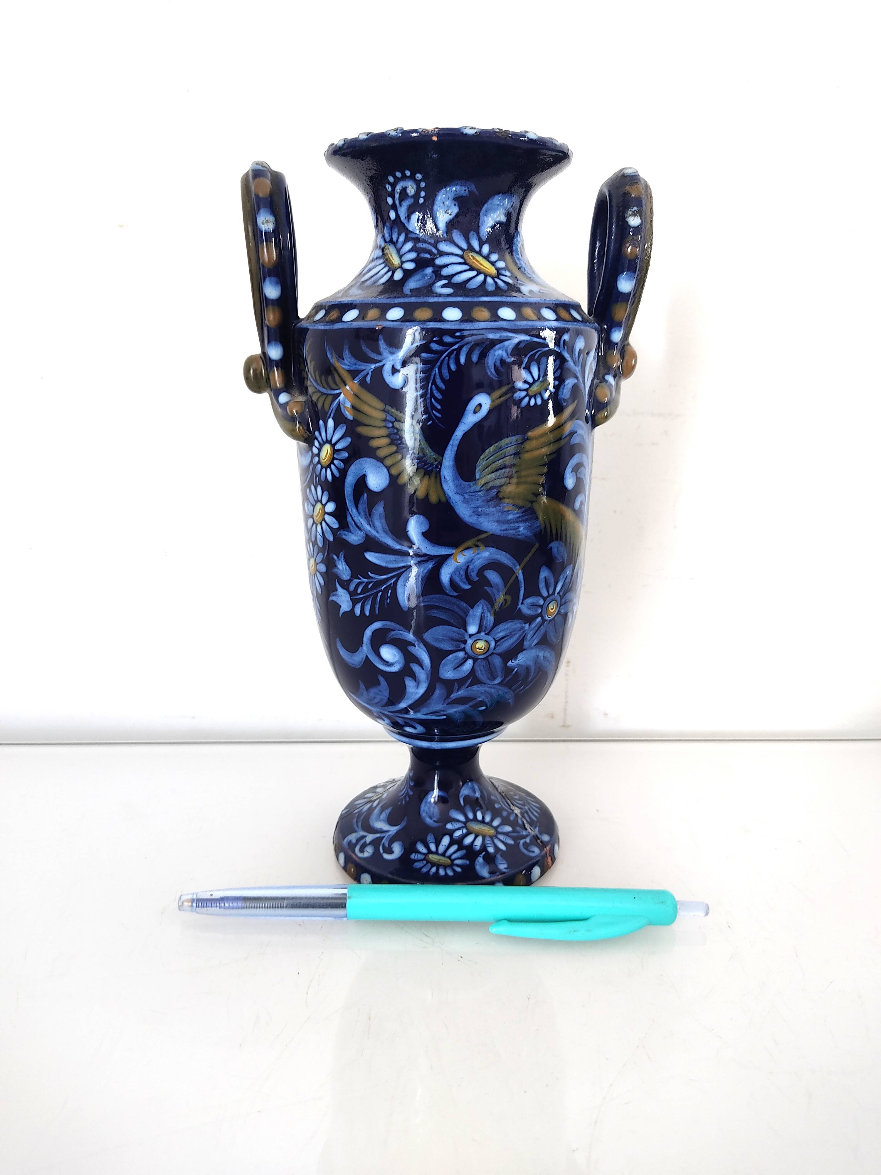 Small blue vase with birds
