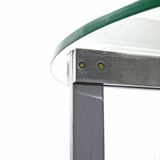 Modernist glass coffee table with stainless steel base