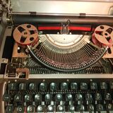 Machine à ecrire remington portable 50's  portable avec sa boite originale coloris gris