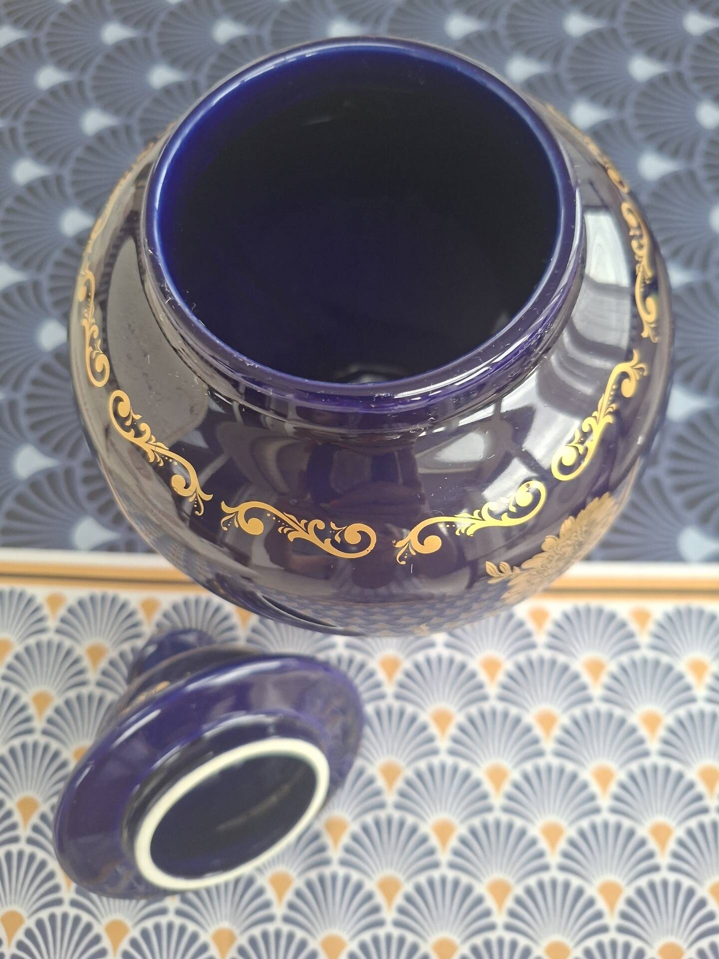 Cobalt blue porcelain bonbonnière with gold decoration on feet.