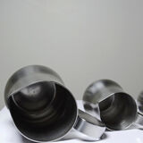 Set of 4 vintage bar measures in brushed stainless steel from the 60s-70s.