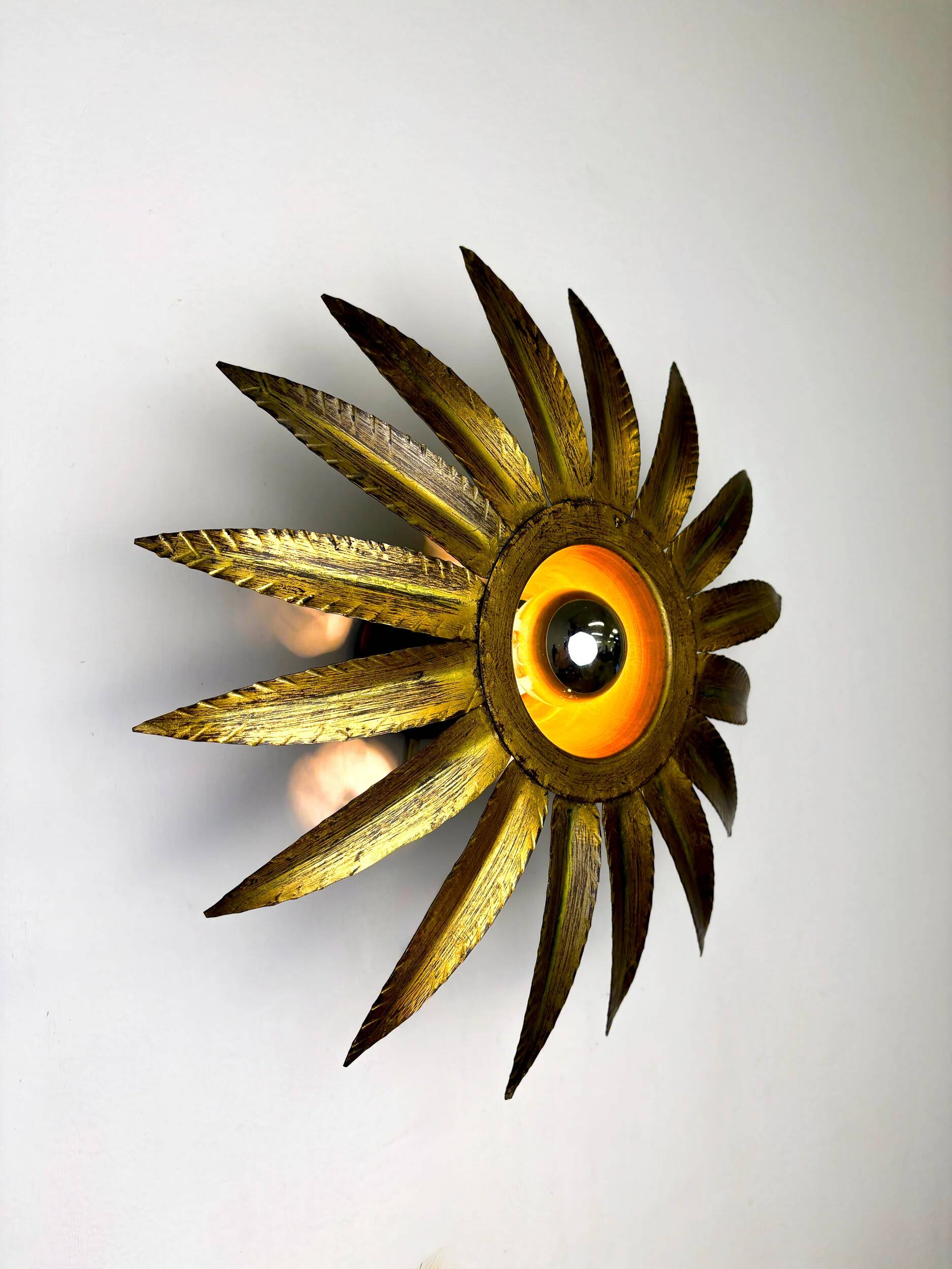 Spanish sunburst flush mount light fixture in gilt iron, Ferro Art, 1960s