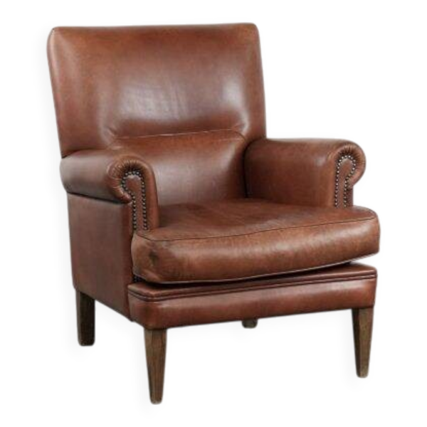 Fauteuil confortable en cuir de vache couleur cognac de style anglais