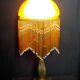 Chandelier with blown glass pendants.