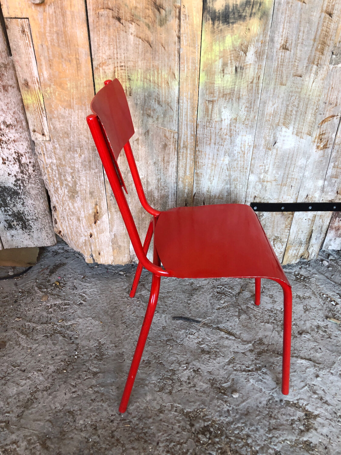 Set of 4 red metal chairs