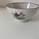 Large light grey speckled earthenware bowl with floral decoration – 1960s–1970s