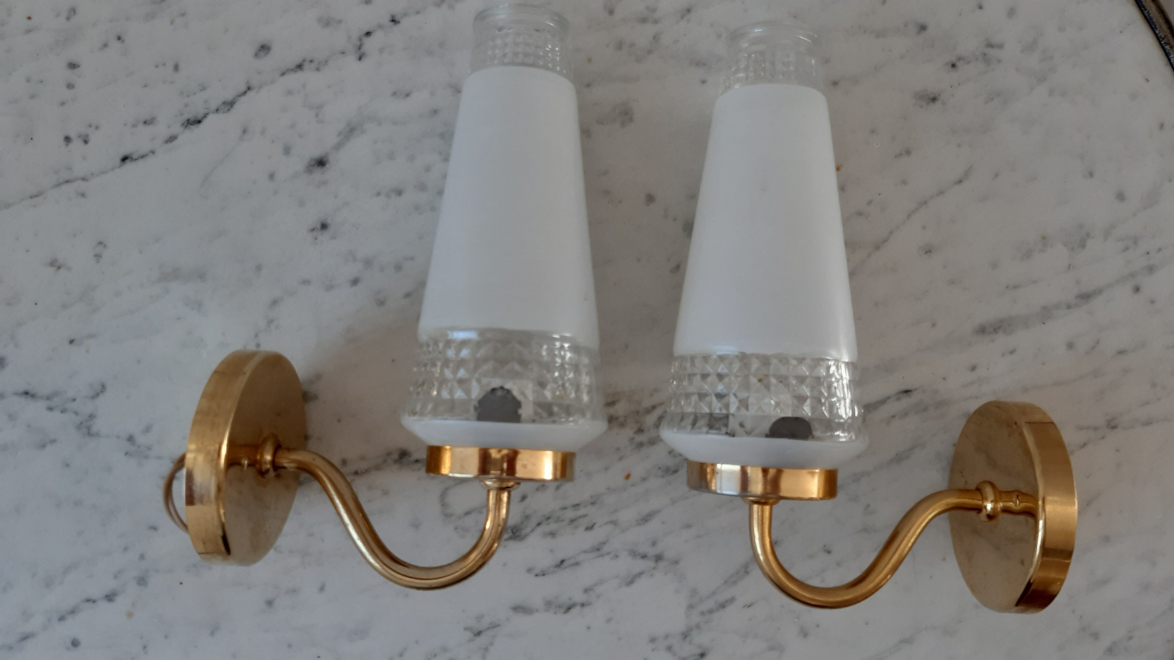 Pair of glass and gilded metal sconces 50s