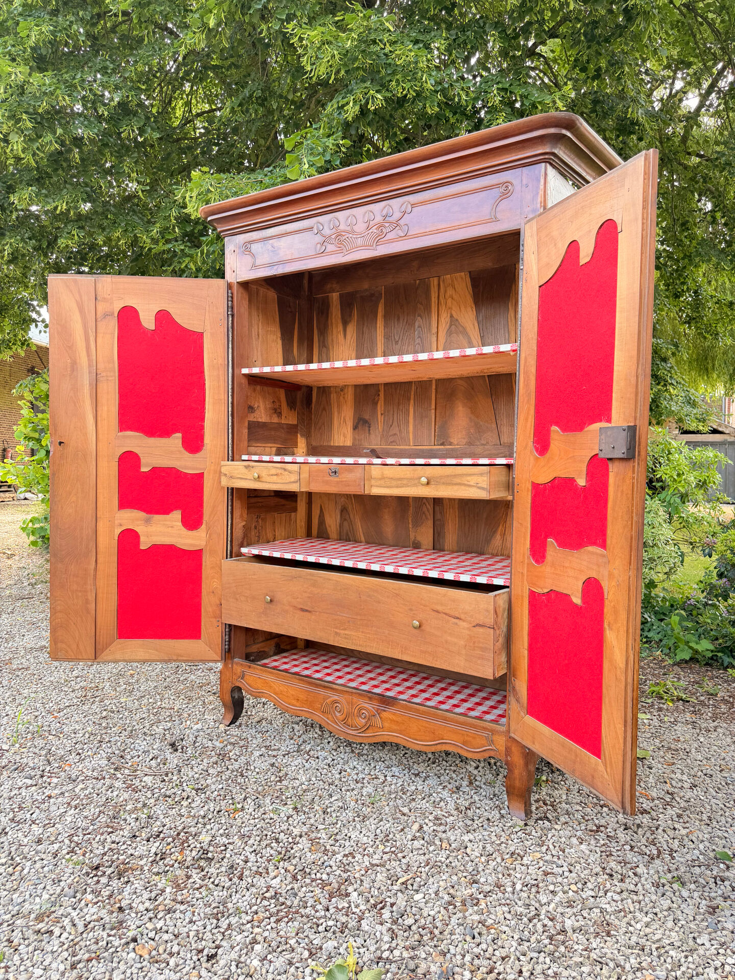Bressane wardrobe in walnut in Louis XV style, 19th century.