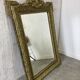 Antique mirror with a pediment