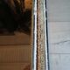 Antique mirror with carved wooden frame