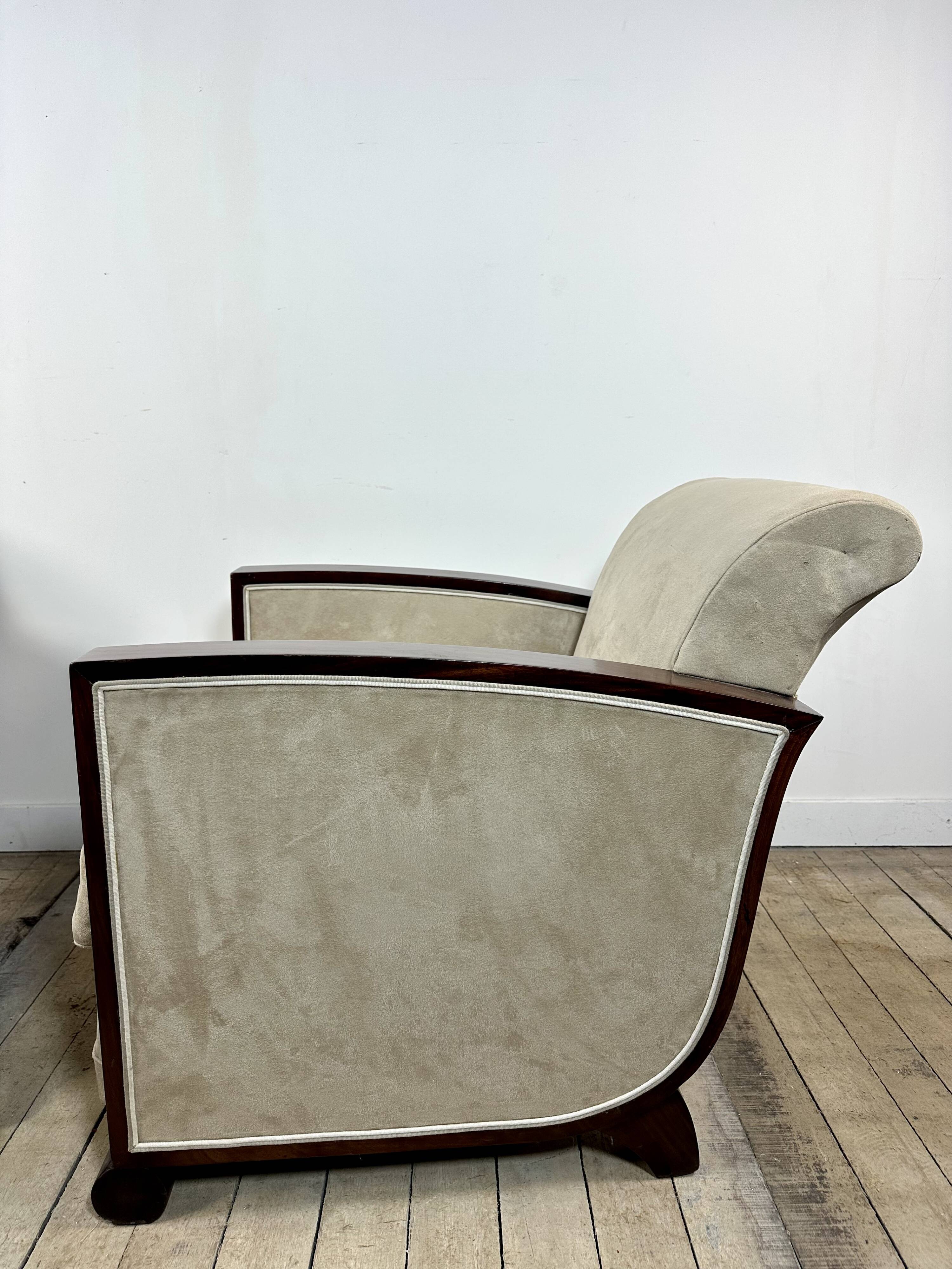 Pair of Art Deco armchairs in rosewood and suede.