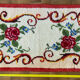 Vintage wool rug with floral decor