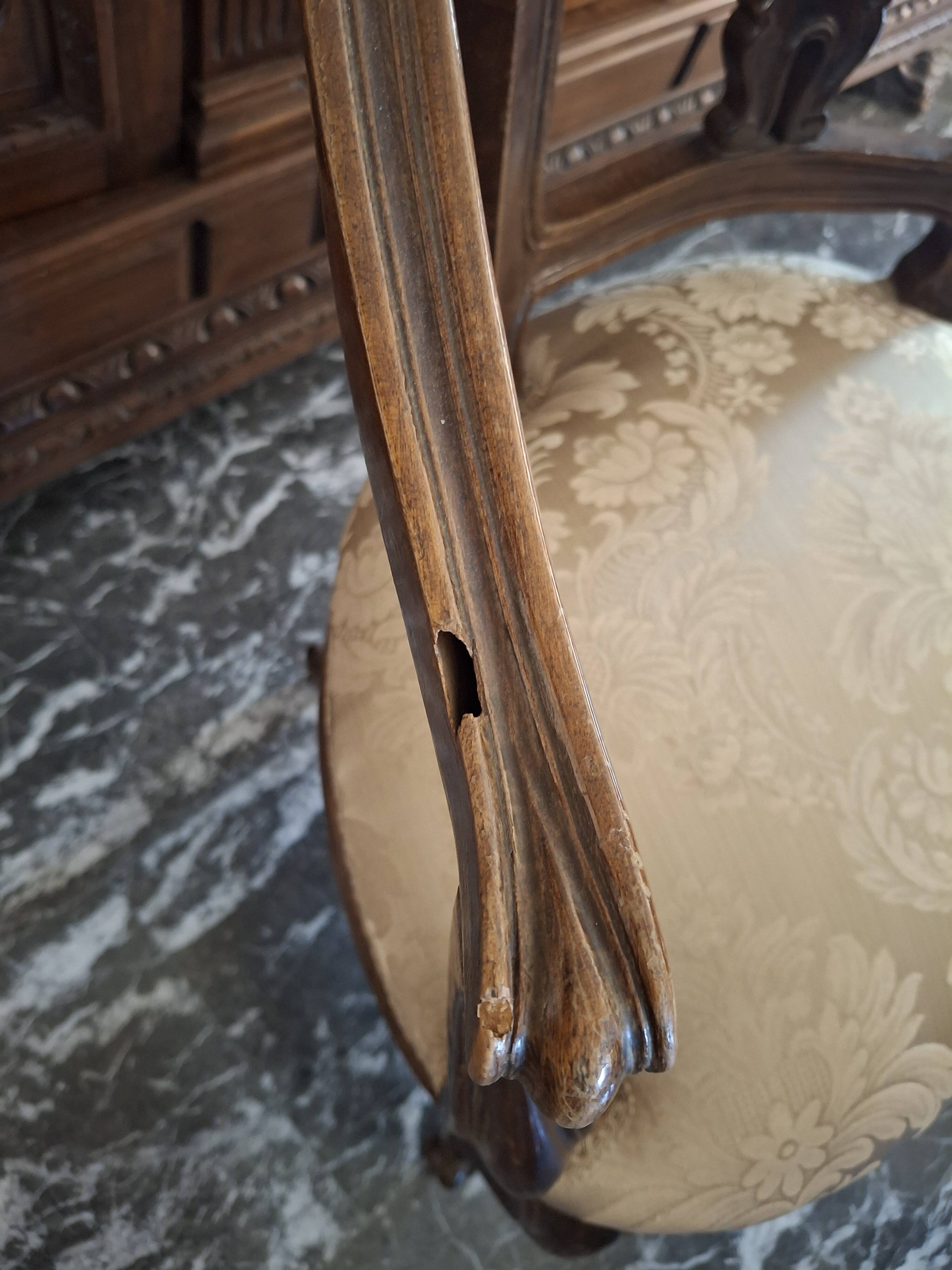Pair of Italian armchairs from the 1960s with matching ottoman.