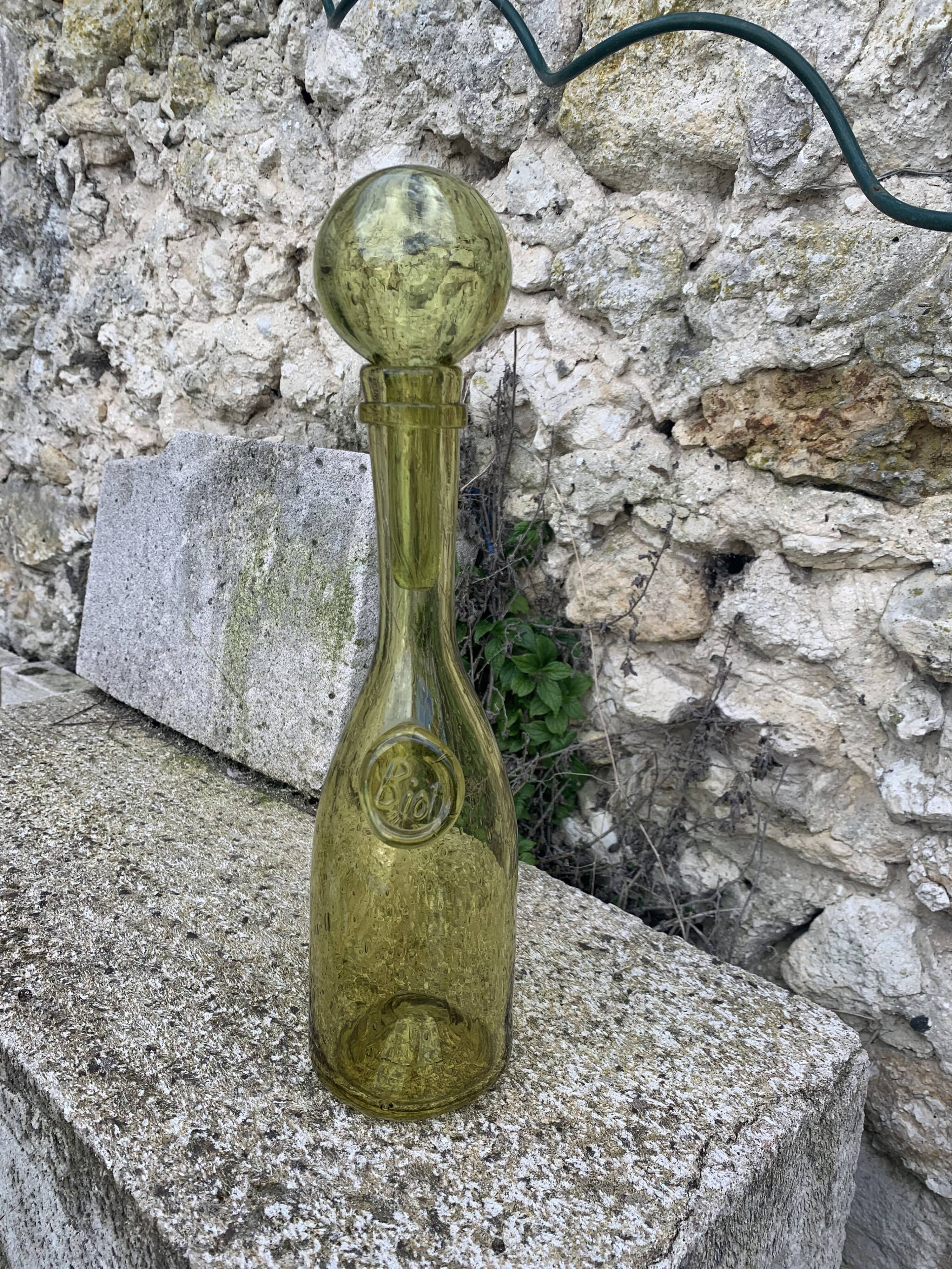 Glassblown glass decanter from the Biot collector glassworks